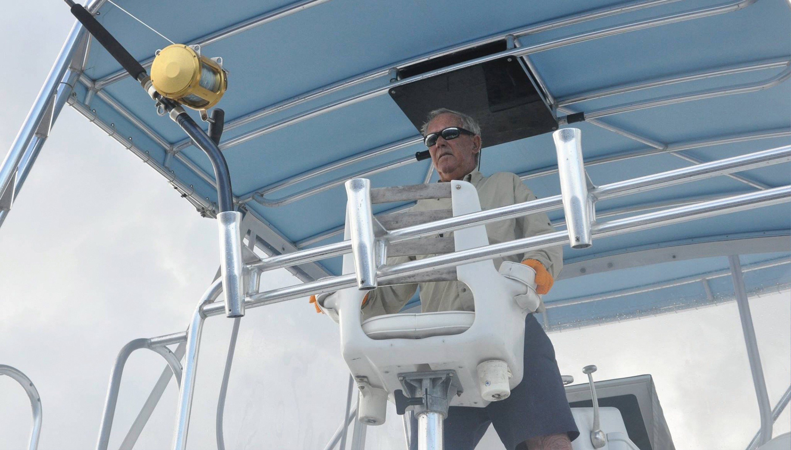 Captain Alan Card at the helm of the Challenger