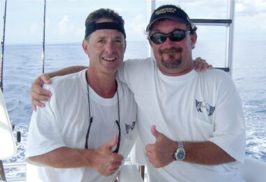 captain and boat owner on boat