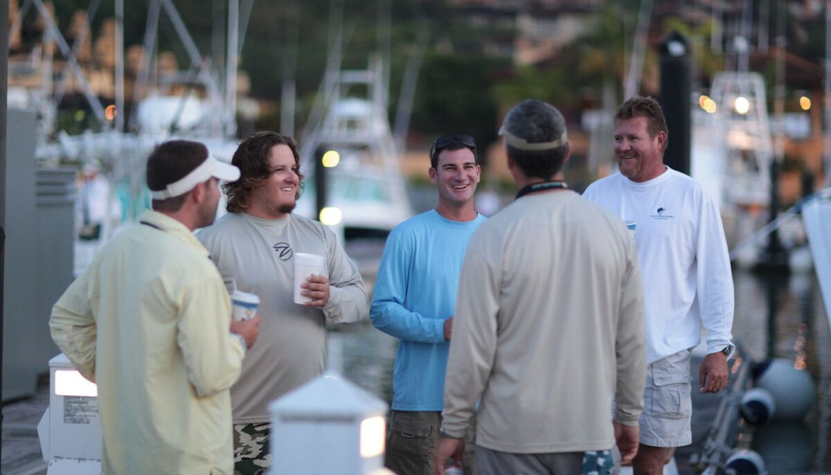 captain and crew talking at dock