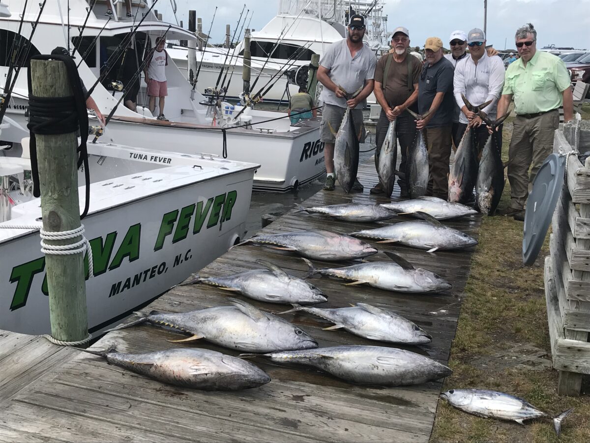 The crew of the Tuna Fever with fish.