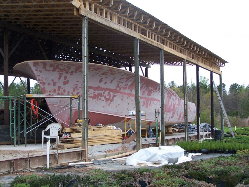 Hull #1 Winter Custom Yachts in the barn and under construction.