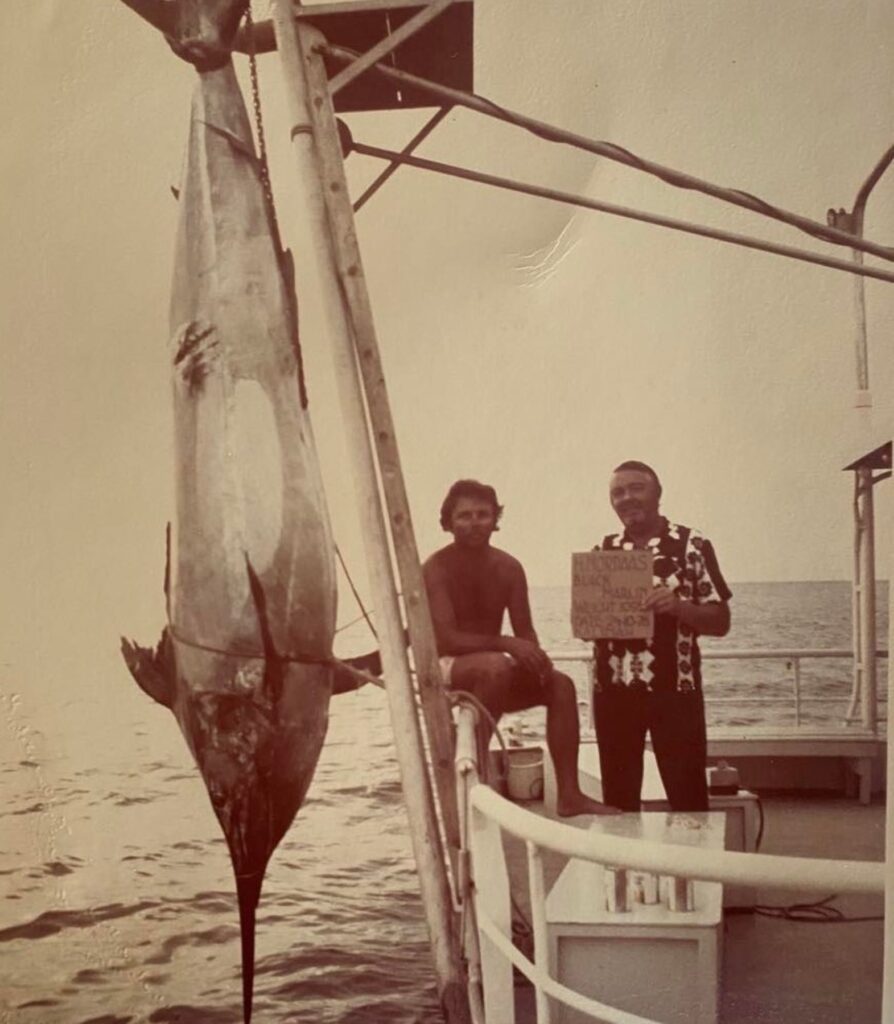 marlin hanging on a scale 