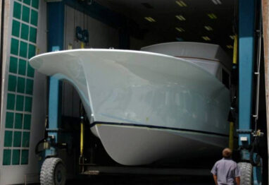 sportfishing boat ownership with a new boat coming out of the build shed
