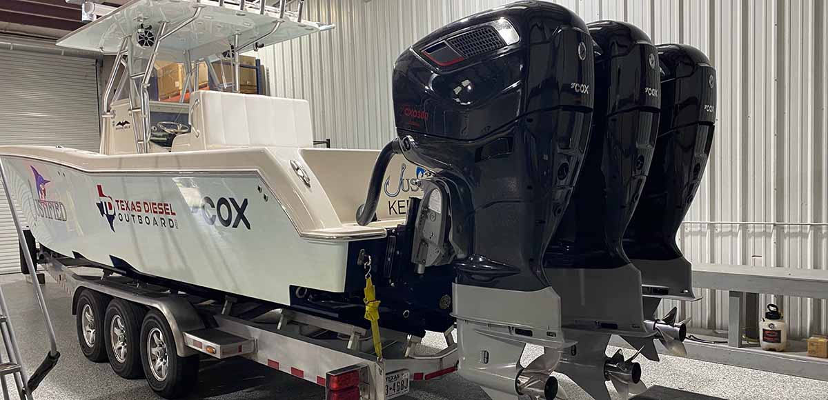 outboard boat with cox diesel engines