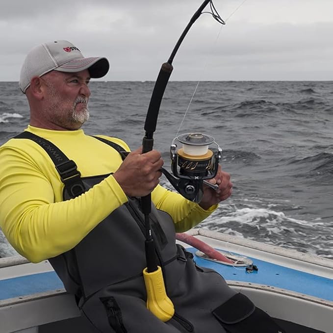 cush-it a guy fishing a fish