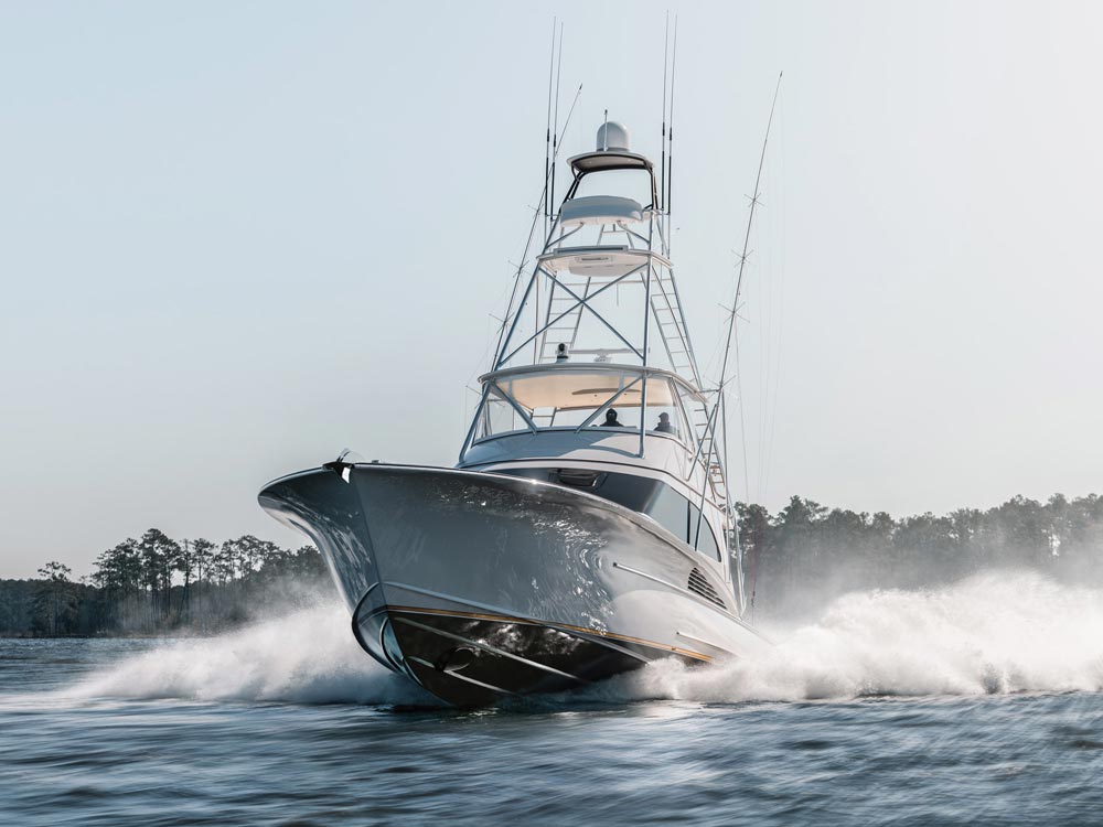 jarrett Bya sportfish boat in white color running on the ocean