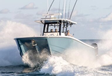 Invincible Boats 36' Catamaran running on the ocean in blue hull color