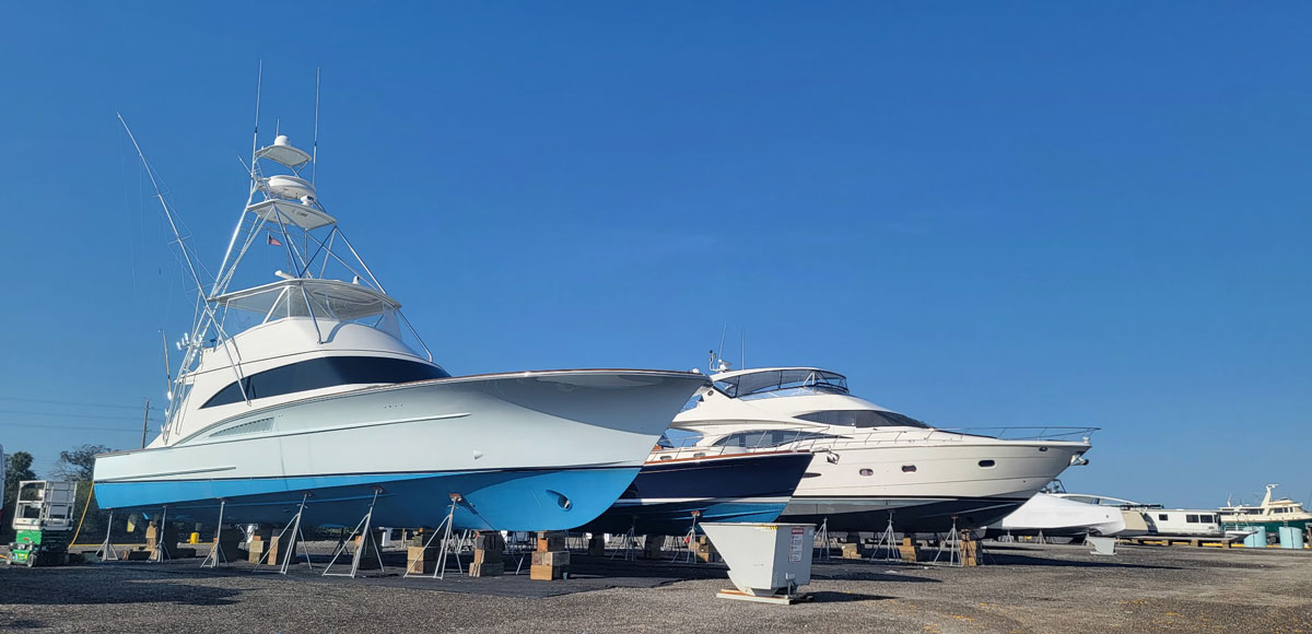 several boats in the boatyard at Indiantown Marine Center