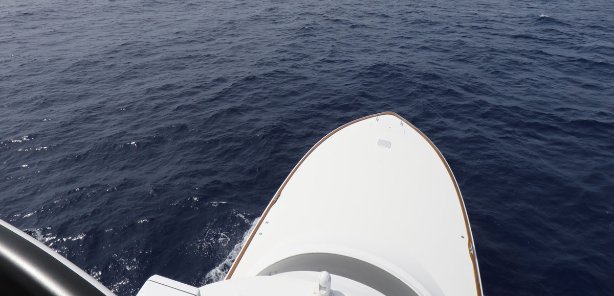 the bow of a sportfishing boat for the featured image in a story on how to Hire a Yacht Delivery Captain