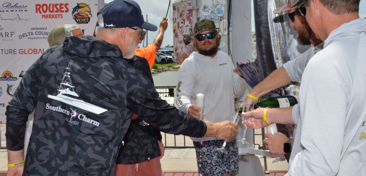 Southern Charm team doing a toast at the Cajun Canyons Billfish Classic