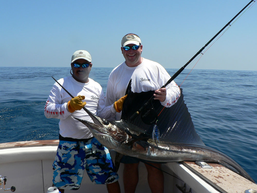 Sailfish being held up with Jim turner and mate