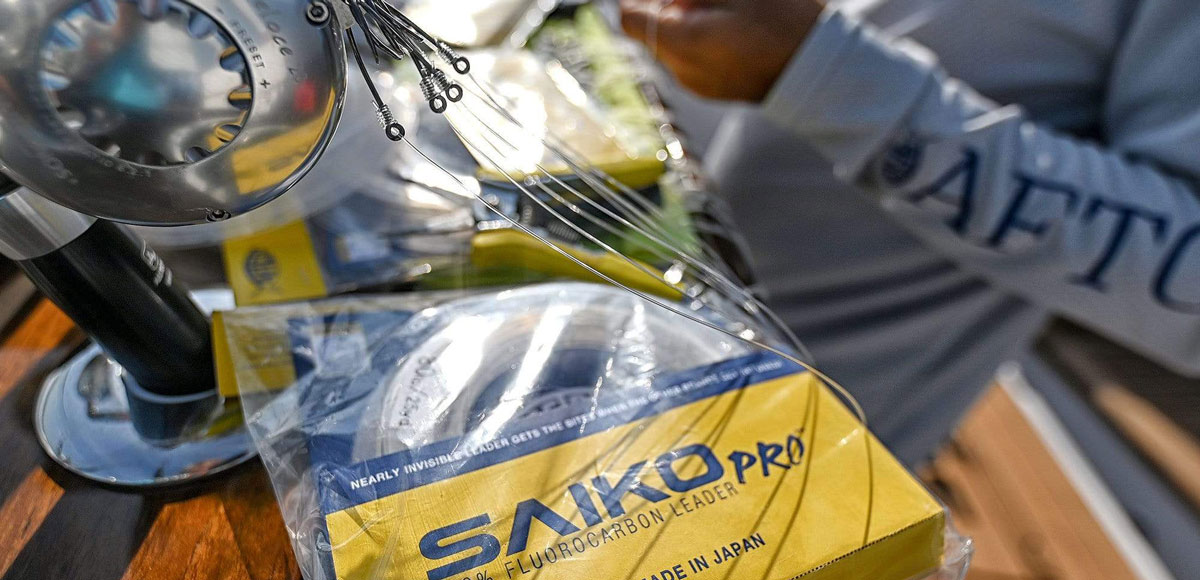 fluorocarbon fishing leader by aftco showing a yellow package with blue writing