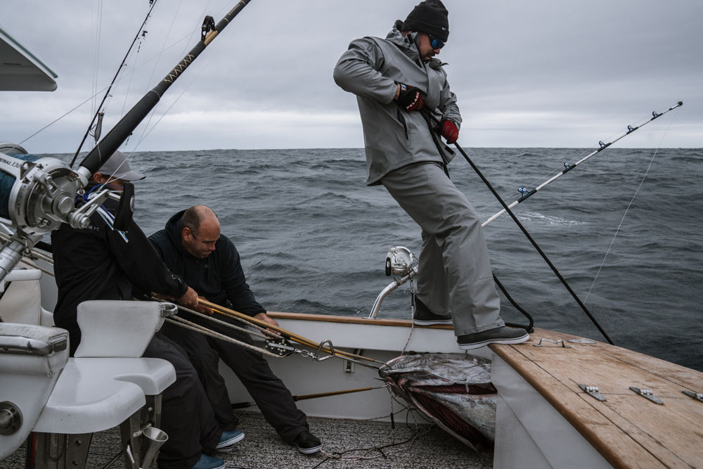 guys wearing pelagic foul weather gear offshore fishing