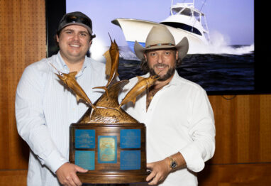 Captain of the Year Phillip Fender left and the boats owner right