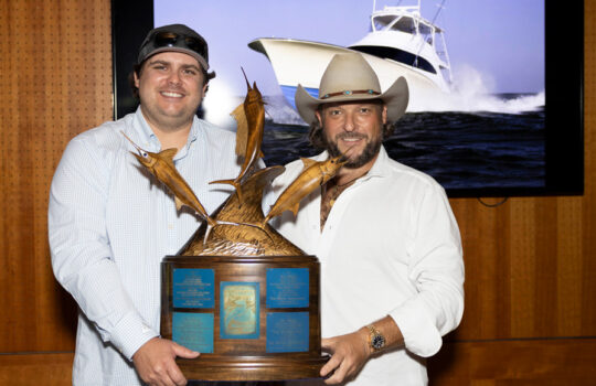 Captain of the Year Phillip Fender left and the boats owner right