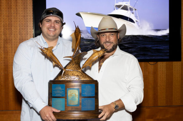 Captain of the Year Phillip Fender left and the boats owner right