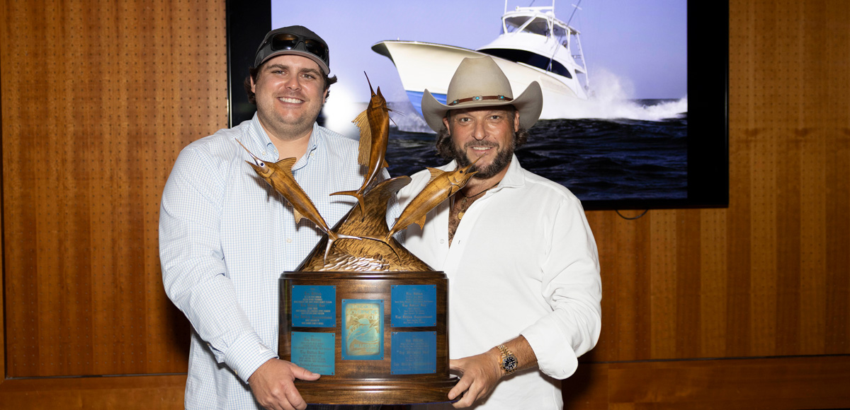 Captain of the Year Phillip Fender left and the boats owner right