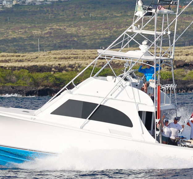 Nick Durham and his boat running off the Kona coast