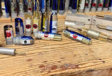 Gary S. Yamamoto and the Magic Behind Hawaii’s Bucket Lure showing a display of lures on a bench