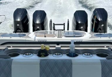 modern outboard quads on the boack of the boat running on the ocean