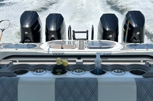 modern outboard quads on the boack of the boat running on the ocean