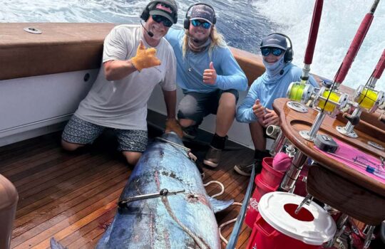 Captain Johnathan Henry crew with winning marlin in the boat