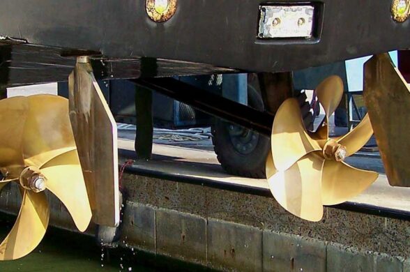 rudder design showing two gold propellers