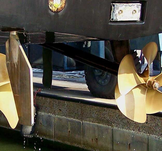 rudder design showing two gold propellers