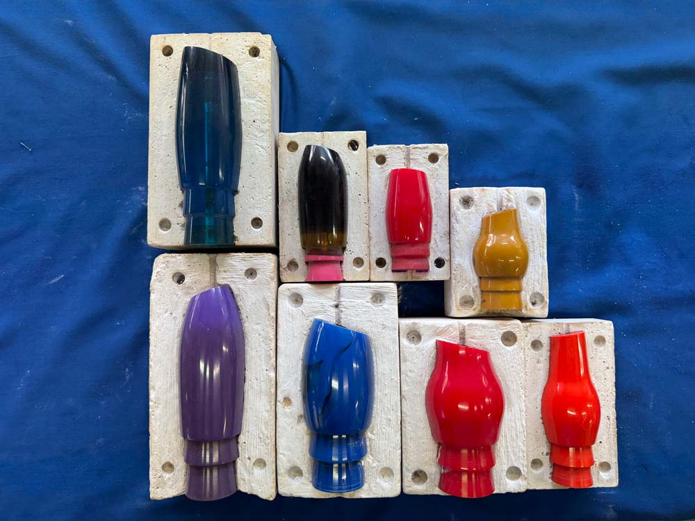 Lure molds in various colors by John Lau