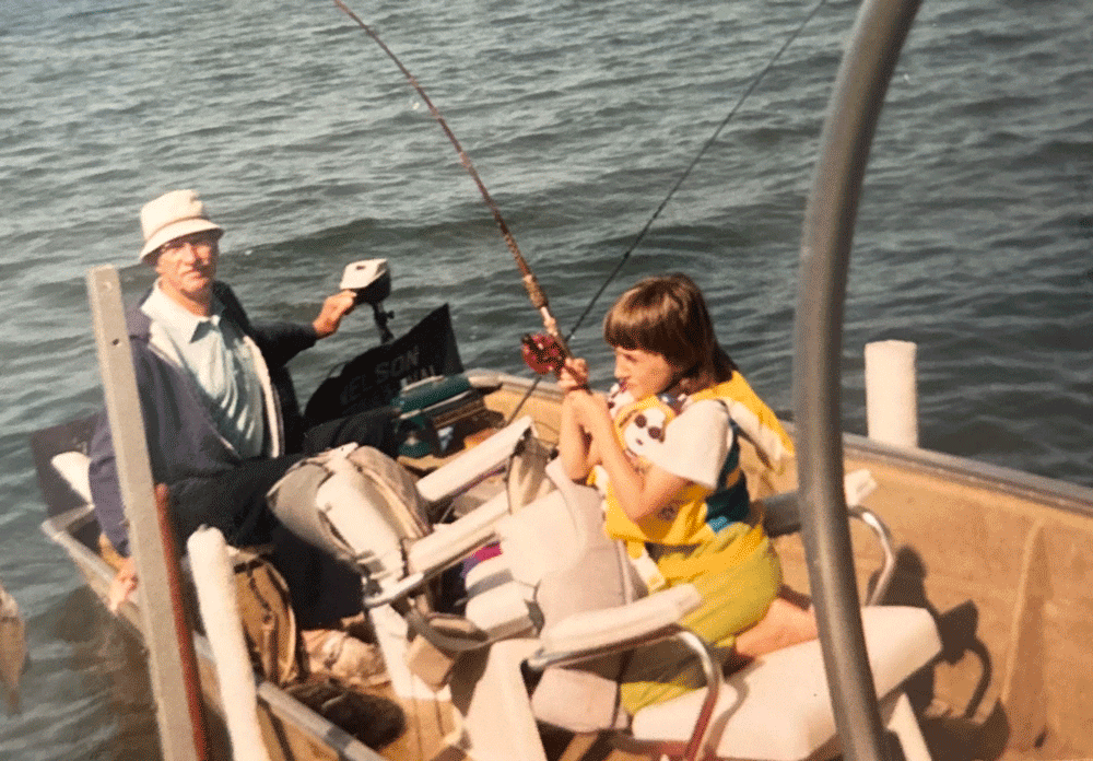 Carly Hysell from Garmin at a very young age hooked up to a fish