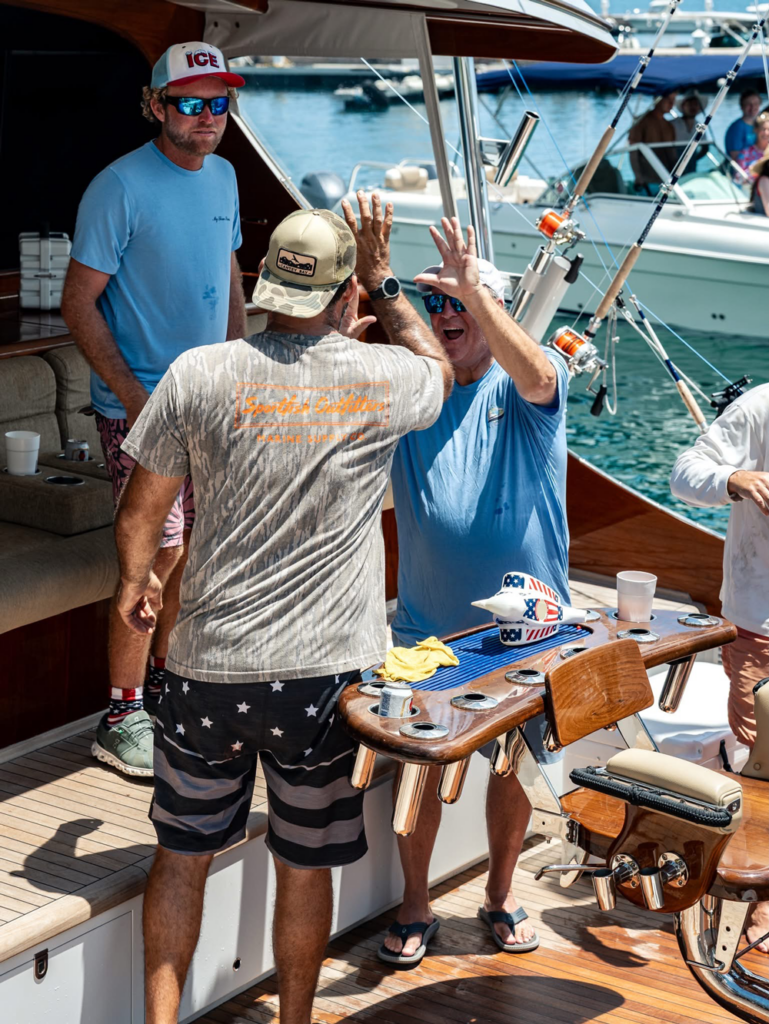 happy crew giving each other high fives